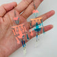 Halloween Acrylic Reflecting Light Skull Dangle Earrings